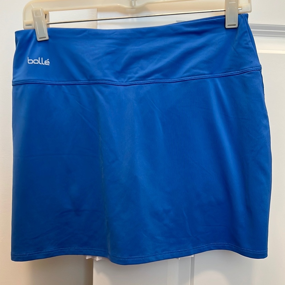 Bolle tennis skirt, royal blue with back pleating. Size medium.